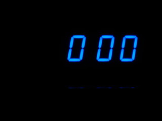 Digital countdown at zero, blue figures on black blackground. Timer, minutes. - 233945348