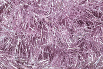 Pink Christmas tinsel roll background