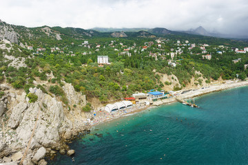 Landscape view from the rock Diva on the resort village Simeiz. Over the tops of the mountains...