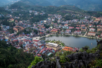 Naklejka na ściany i meble Aerial view of Sapa, Vietnam. Sapa is one of the must-visit locations in the north of Vietnam with its cool weather and the beutiful scenes