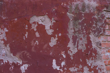 Fragment stukturnoy and painted walls at idle the factory,removed in late autumn