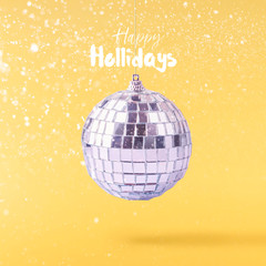 Christmas concept.  Creative Christmas conception made by falling in air shiny disco ball