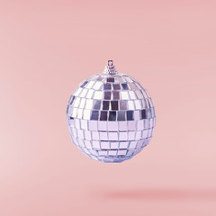 Christmas concept.  Creative Christmas conception made by falling in air shiny disco ball