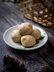 Healthy organic date energy balls with almond, dried fruits and nuts. Food for healthy lifestyle.