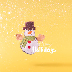 Christmas concept.  Creative Christmas conception made by falling in air christmas cuddly snowman toy