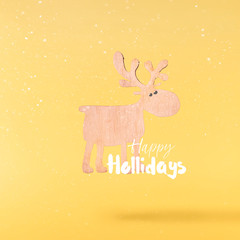 Christmas concept.  Creative Christmas conception made by falling in air christmas wooden deer