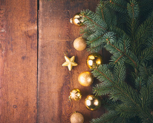 Christmas background. A lot of gold baubles and fir tree