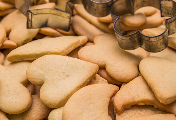 Tasty homemade cookies of different shapes - heart, moon, star, flower, rhombus - baked for Christmas