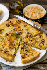 Savoury pie tart with minced meat, cabbage and cheese