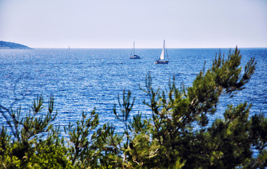 Fototapeta na wymiar Scenic view of a boat sailing in the Adriatic Sea. Croatia