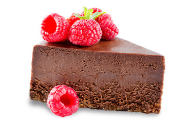 Chocolate cheesecake with fresh berries and mint leaves isolated