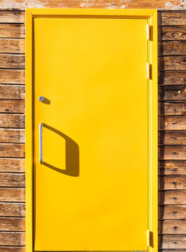 Bright Yellow Front Door With Shadows