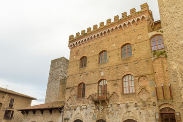 View of old historic buildings and typical towers in San Gimignano. Tuscany, Italy. Horizontally.