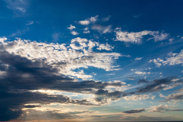 Naklejka na ściany i meble sea beach skyline with clouds and calm water