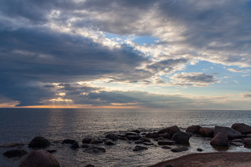 Fototapeta na wymiar sea beach skyline with clouds and calm water