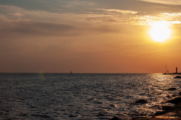 sea beach skyline with clouds and calm water