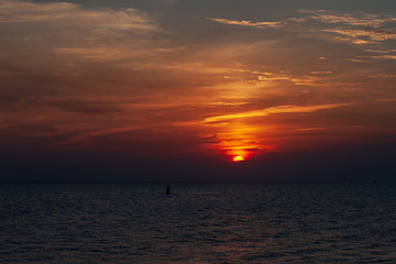 sea beach skyline with clouds and calm water