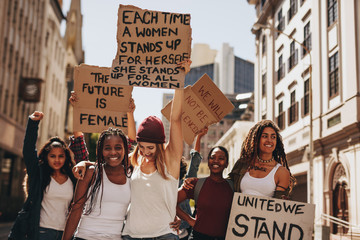 Demonstrators enjoying during a protest for women - obrazy, fototapety, plakaty
