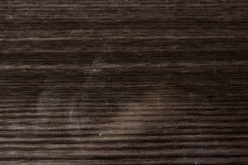 Dark wooden background top view