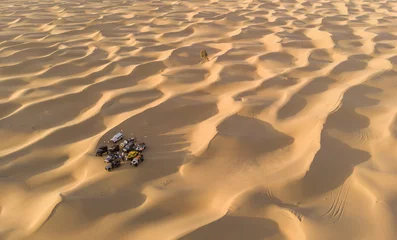 Abwaschbare Fototapete Sandige Wüste cars in a desert to do some dune bashing