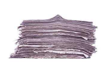 Stack of newspapers isolated on white