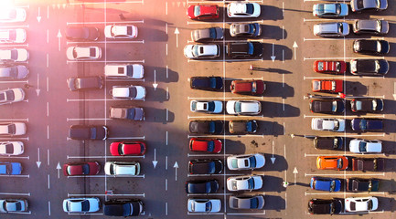Aerial. Car parks.  Parking lot with a crowd of cars.