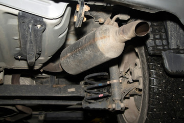 Car Repair on a Lift.