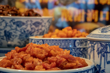Chinese food in blue and white porcelain dishes