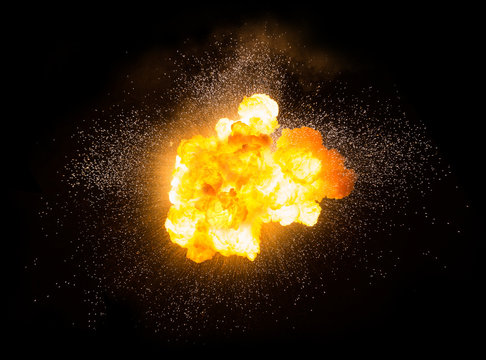 Forms and textures of an explosion of powder in the form of a cloud of colors red and yellow on a black background