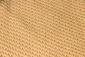Light beige knitted background