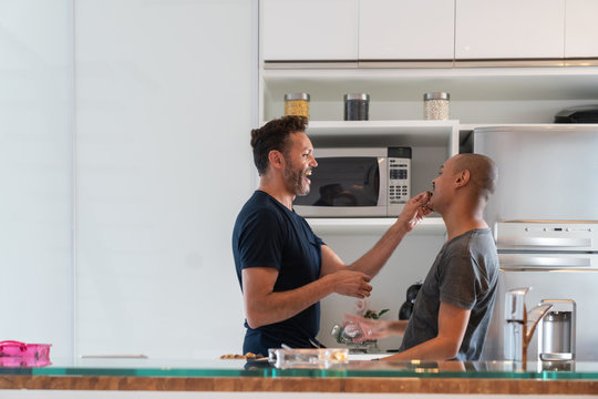 Gay Couple Cooking at Home