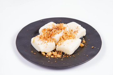 Dumplings with cottage cheese (traditional polish dish called lazy pierogi/ leniwe pierogi) fried with bread crumbs 