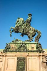 Statue of Prince Eugene of Savoy in front of Hofburg Palace in Vienna, Austria, sunny day, blue sky