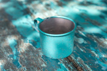 Rustic antique turquoise blue tin mug