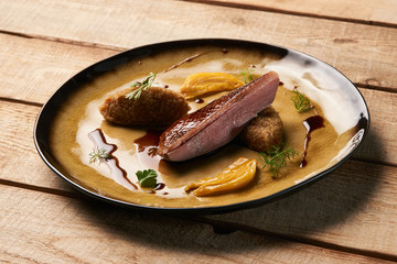 Quinoa with Duck breast meat and sweet chili sauce with orange f