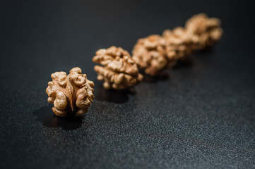 walnut on black background