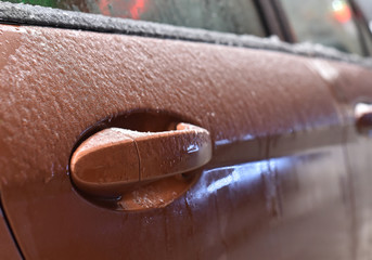 icy car door handle