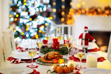 Christmas dinner at fire place and Xmas tree.