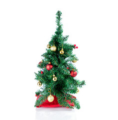 Decorated Christmas tree isolated on a white background setting