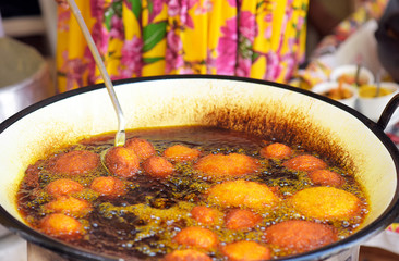 Brazilian food: acaraje fried on the board of baiana