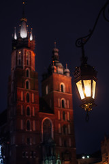 Fototapeta na wymiar vintage lantern is illuminate the street. A magnificent old buil