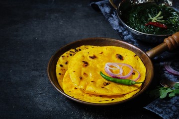 Sarson ka saag and Makki ki roti /Indian corn bread with mustard leaves gravy