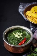 Sarson ka saag and Makki ki roti /Indian corn bread with mustard leaves gravy