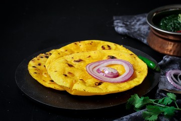 Sarson ka saag and Makki ki roti /Indian corn bread with mustard leaves gravy