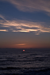 Naklejka na ściany i meble sunrise over the sea,horizon,sun,clouds,sky, beautiful,light,water,