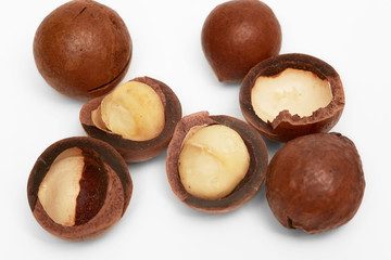 Macadamia nuts on white background, isolated, closeup