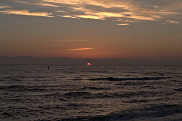 Fototapeta na wymiar sunrise at sea,beautiful, clouds,sky, water, sunset, sea, sun,orange, nature, horizon,
