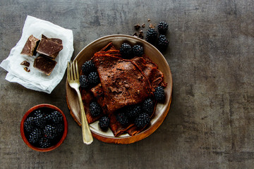 Chocolate crepes with blackberries
