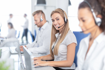 Call center worker accompanied by her team.