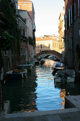 Fototapeta na wymiar Venice, canal with moored boats
